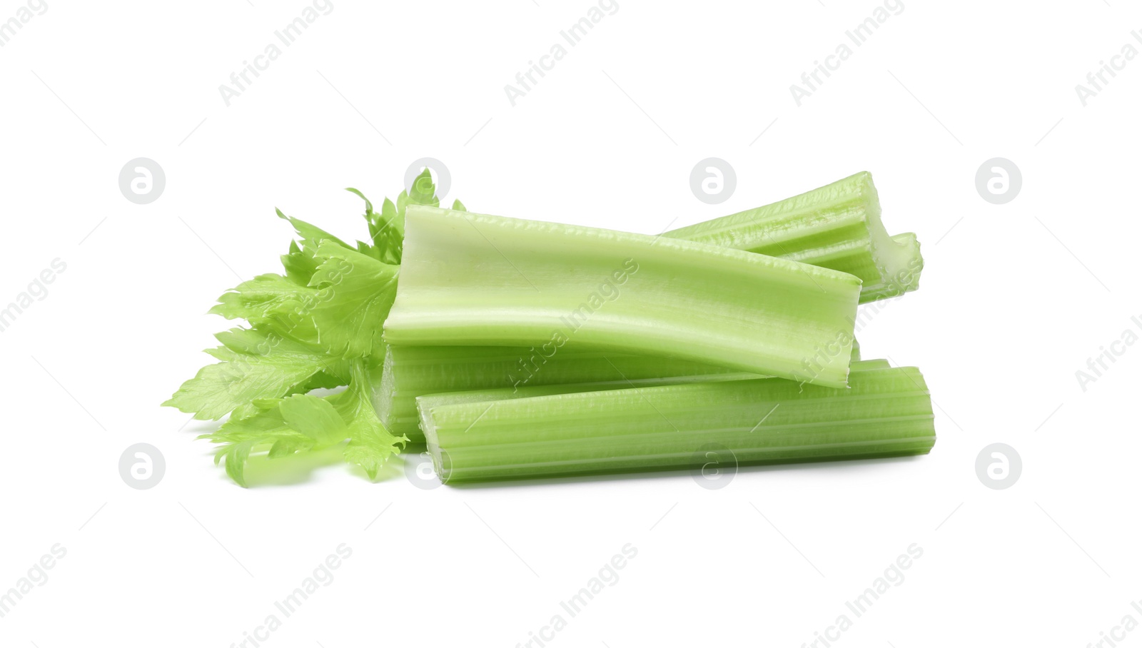 Photo of Fresh green cut celery isolated on white