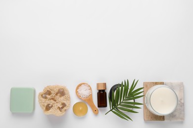 Photo of Flat lay composition with different spa products on white background, space for text