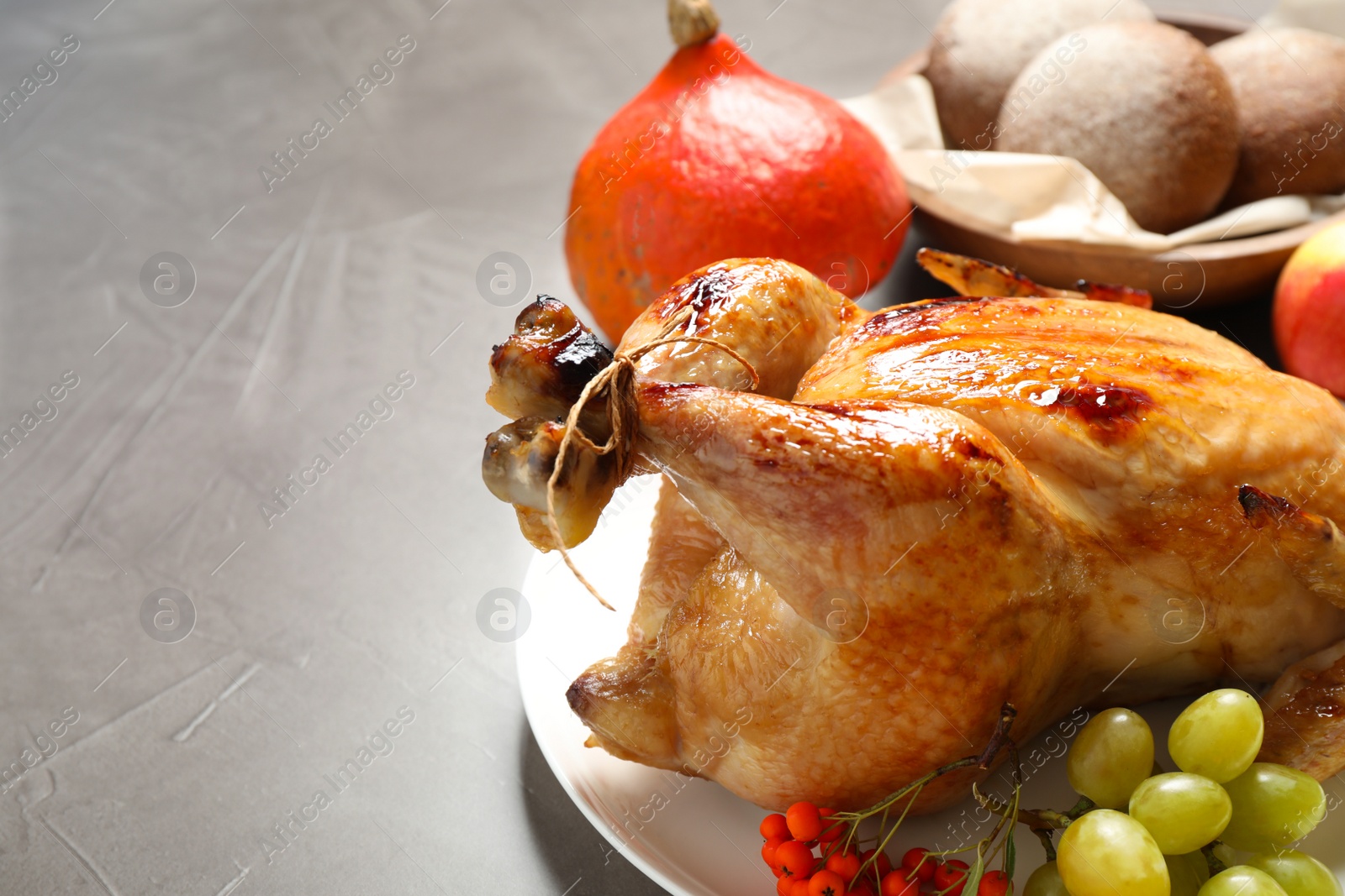Photo of Closeup of turkey on grey background. Happy Thanksgiving day