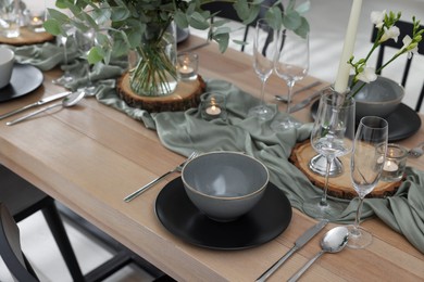 Festive table setting with beautiful tableware and decor