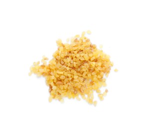 Photo of Pile of uncooked bulgur isolated on white, top view