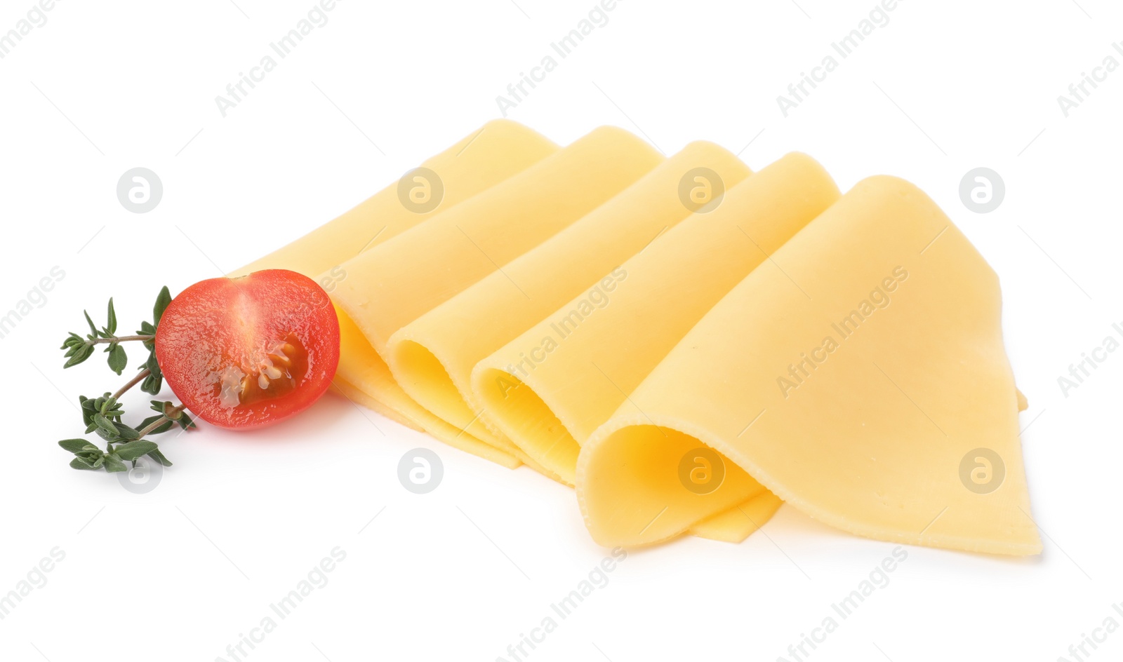 Photo of Slices of tasty fresh cheese, thyme and tomato isolated on white