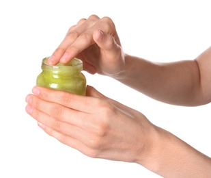 Photo of Woman with jar of hemp lotion on white background, closeup