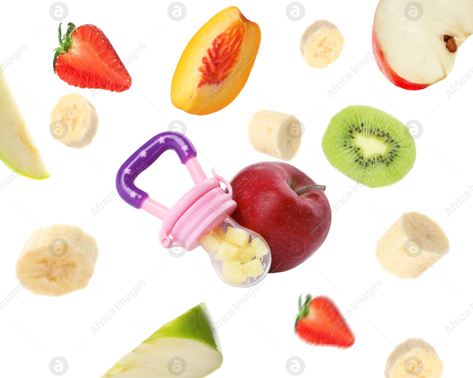 Image of Nibbler and different fruits falling on white background. Baby feeder