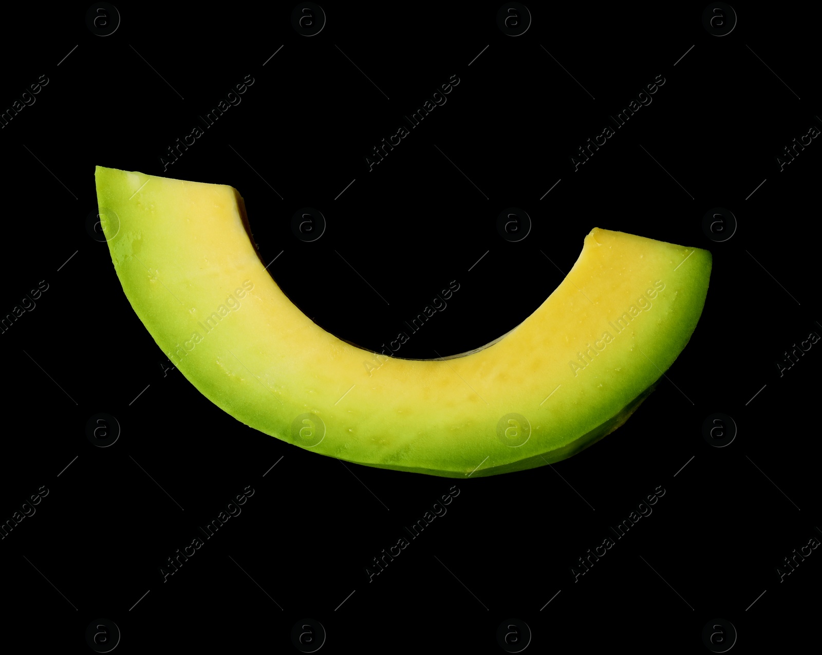 Photo of Slice of fresh avocado on black background