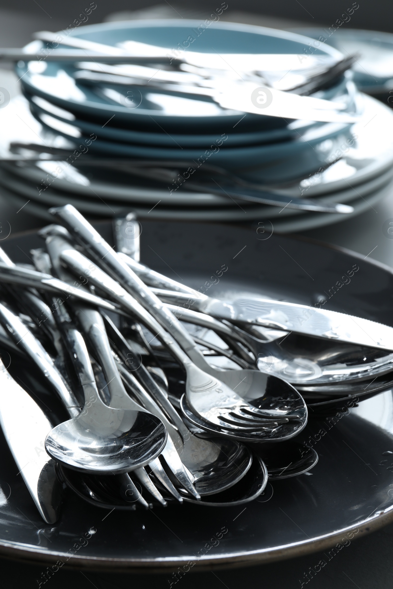 Photo of Different clean kitchenware on light grey table