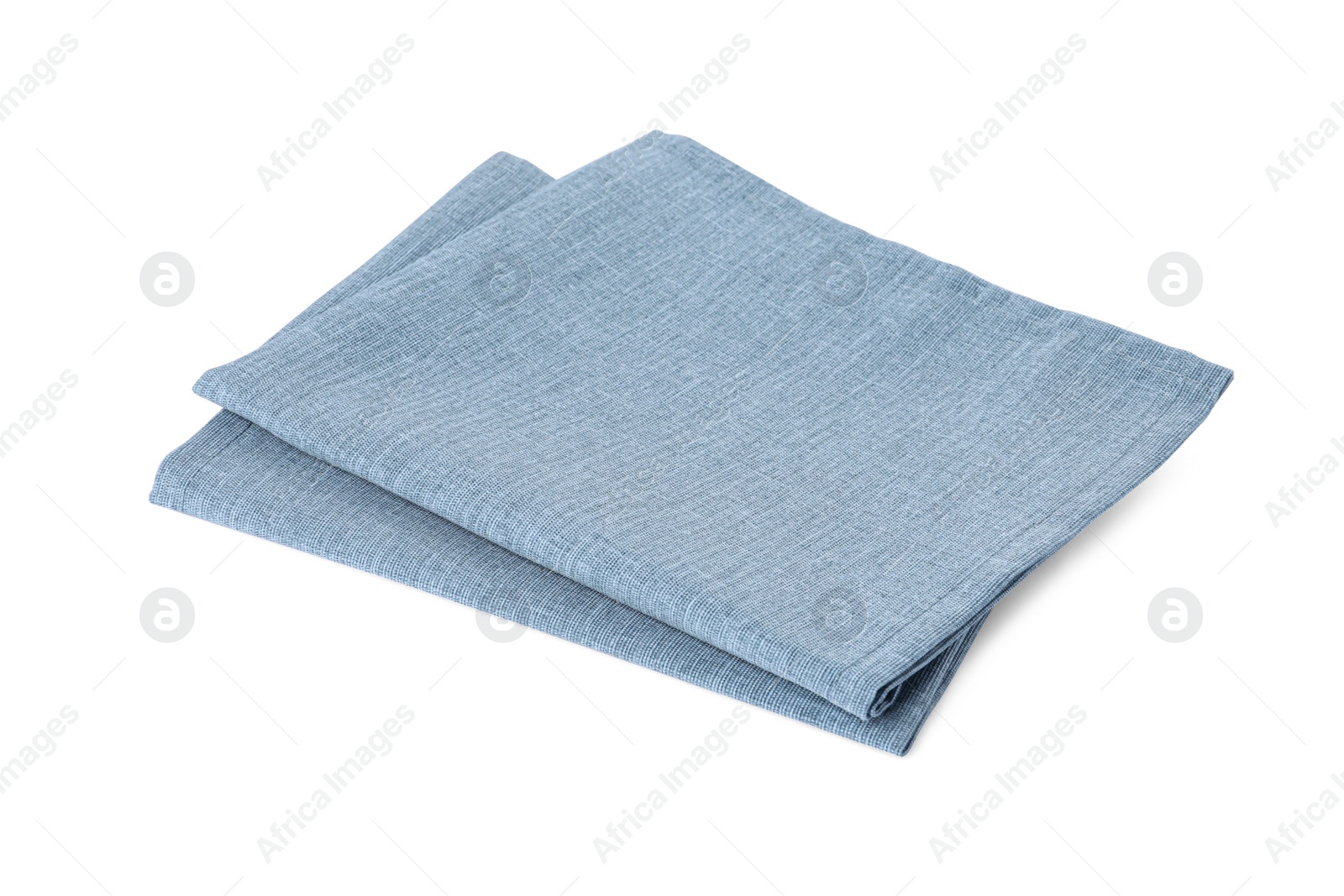 Photo of New clean light blue cloth napkins isolated on white