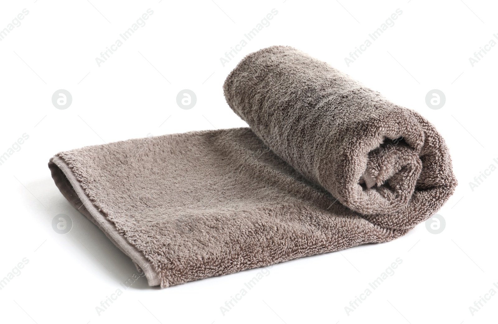 Photo of Fresh soft rolled towel isolated on white