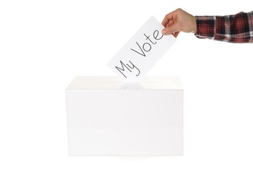 Photo of Man putting his vote into ballot box on white background, closeup