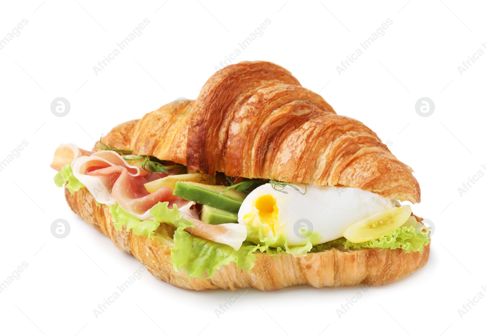 Photo of Delicious croissant with prosciutto, avocado and egg isolated on white