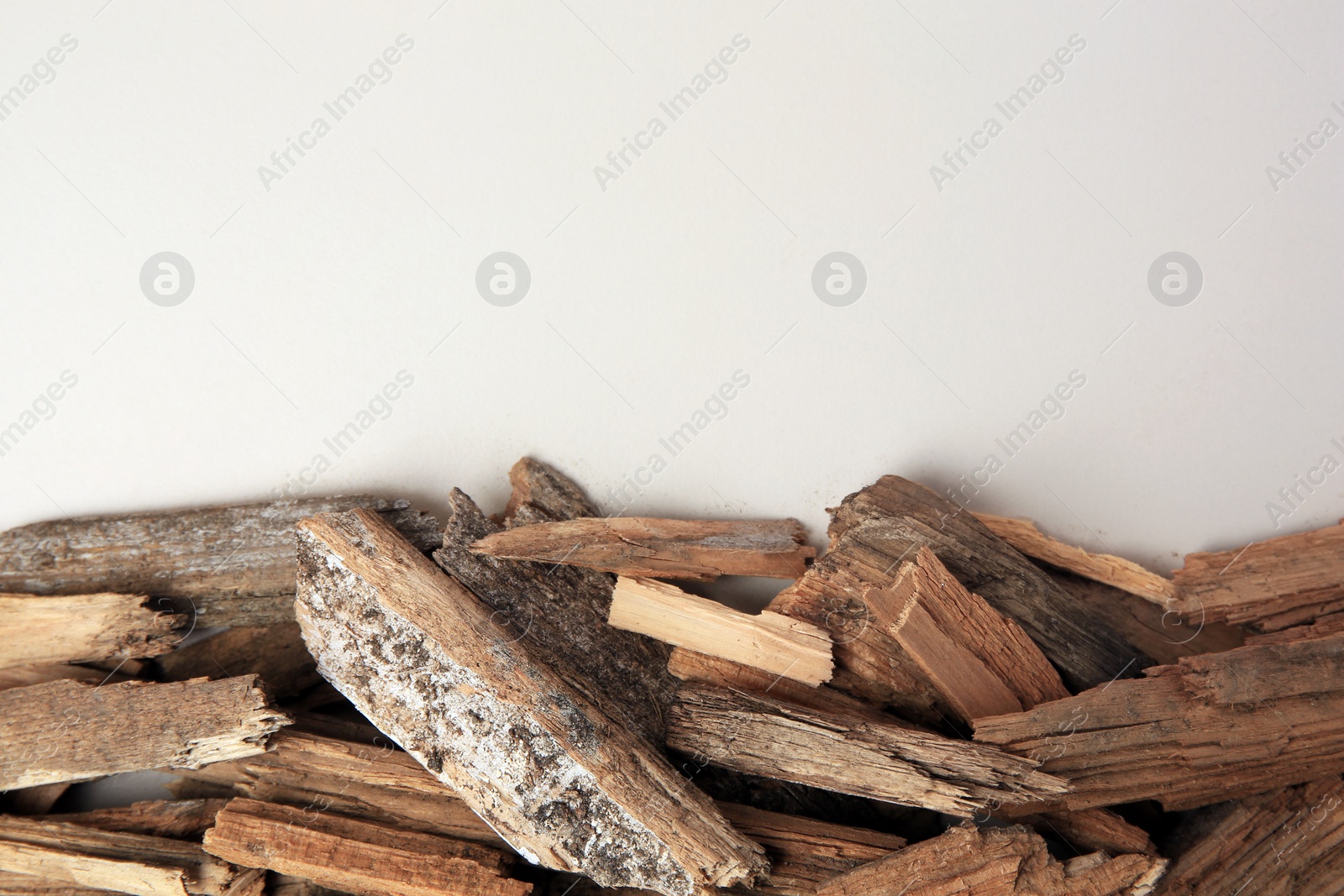 Photo of Wood chips on beige background, flat lay. Space for text