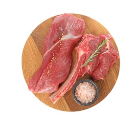 Photo of Pieces of raw beef meat and spices isolated on white, top view