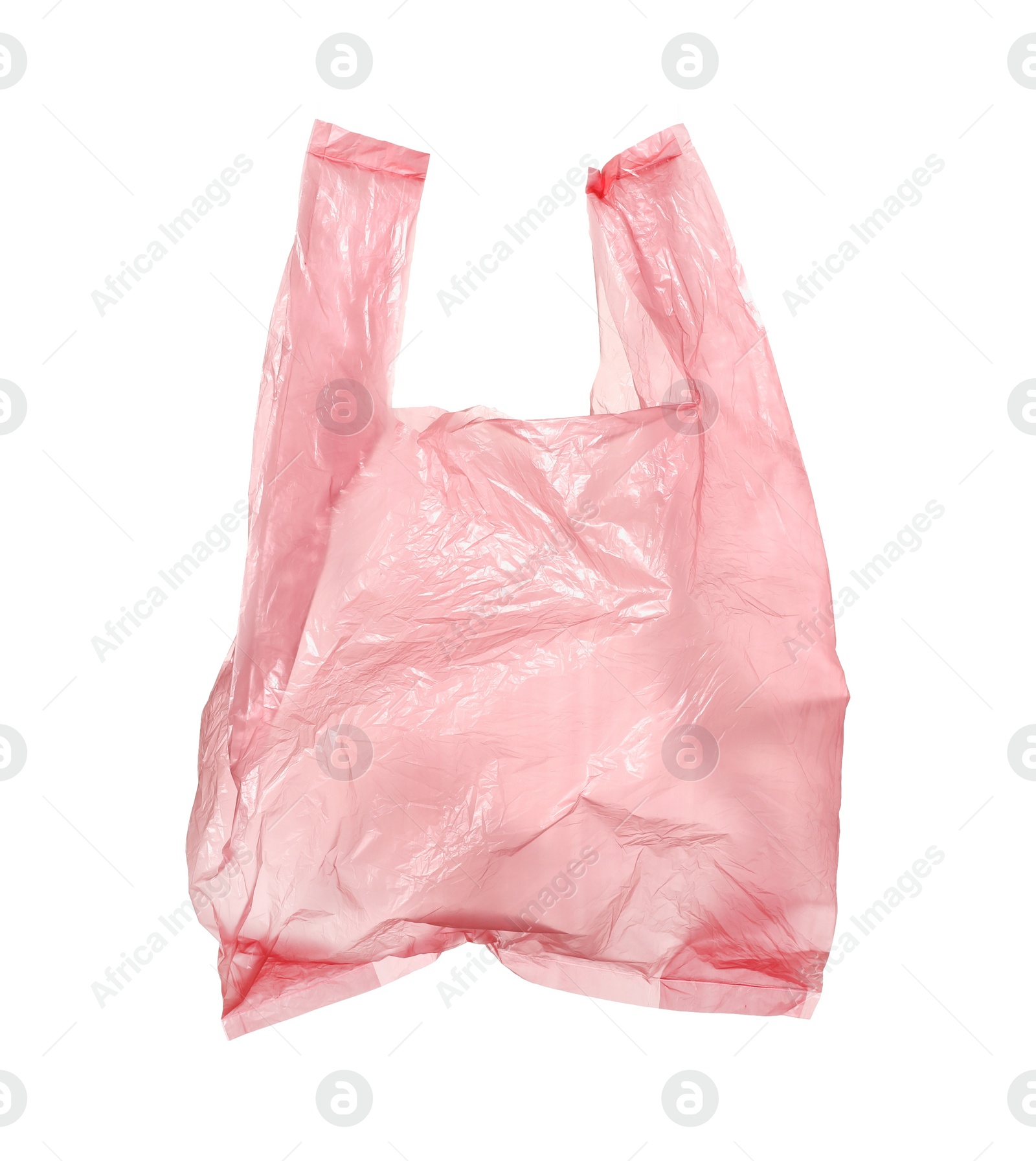 Photo of One pink plastic bag isolated on white