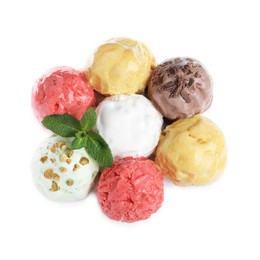 Photo of Scoops of different ice creams and mint on white background, top view