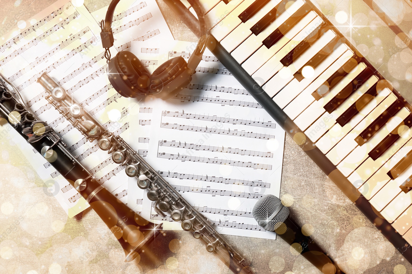 Image of Flat lay composition with different musical instruments and microphone on light grey background