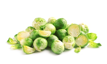 Pile of fresh Brussels sprouts on white background