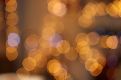 Photo of Blurred view of beautiful Christmas lights. Bokeh effect