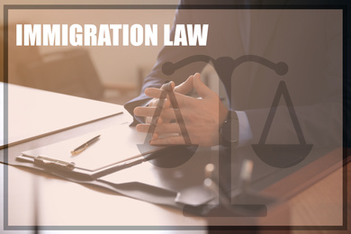 Image of Lawyer at table in office, closeup. Immigration law concept