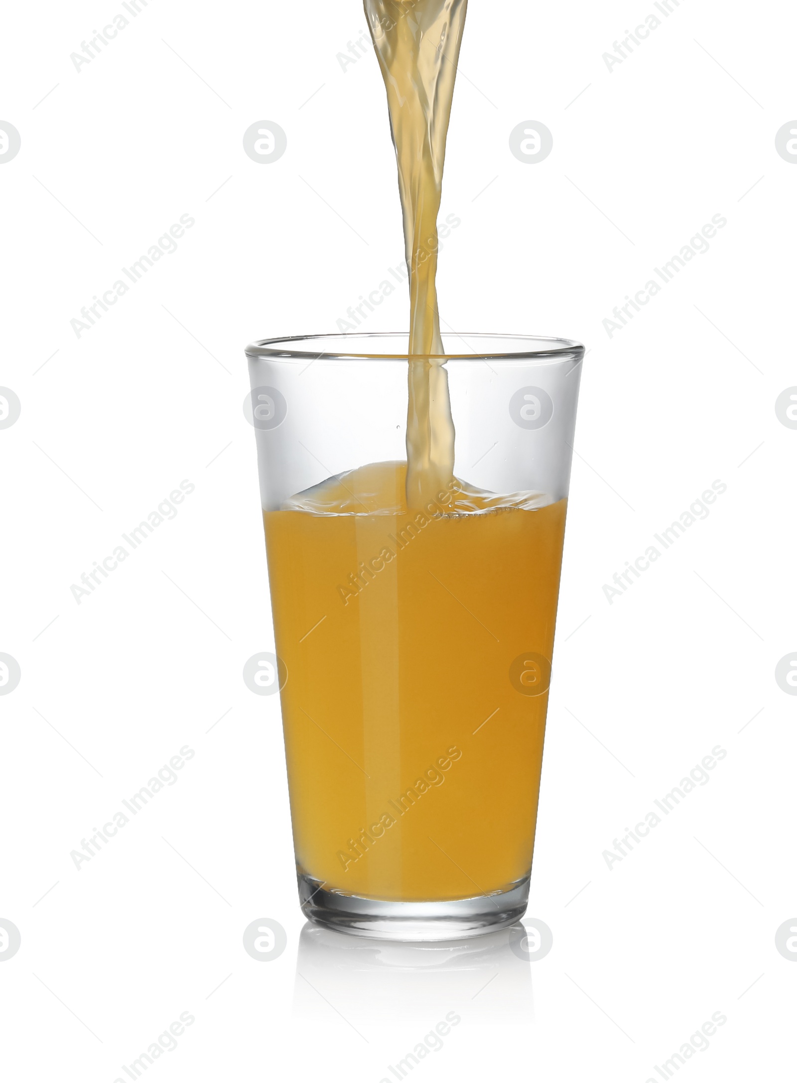 Photo of Pouring fresh juice into glass on white background