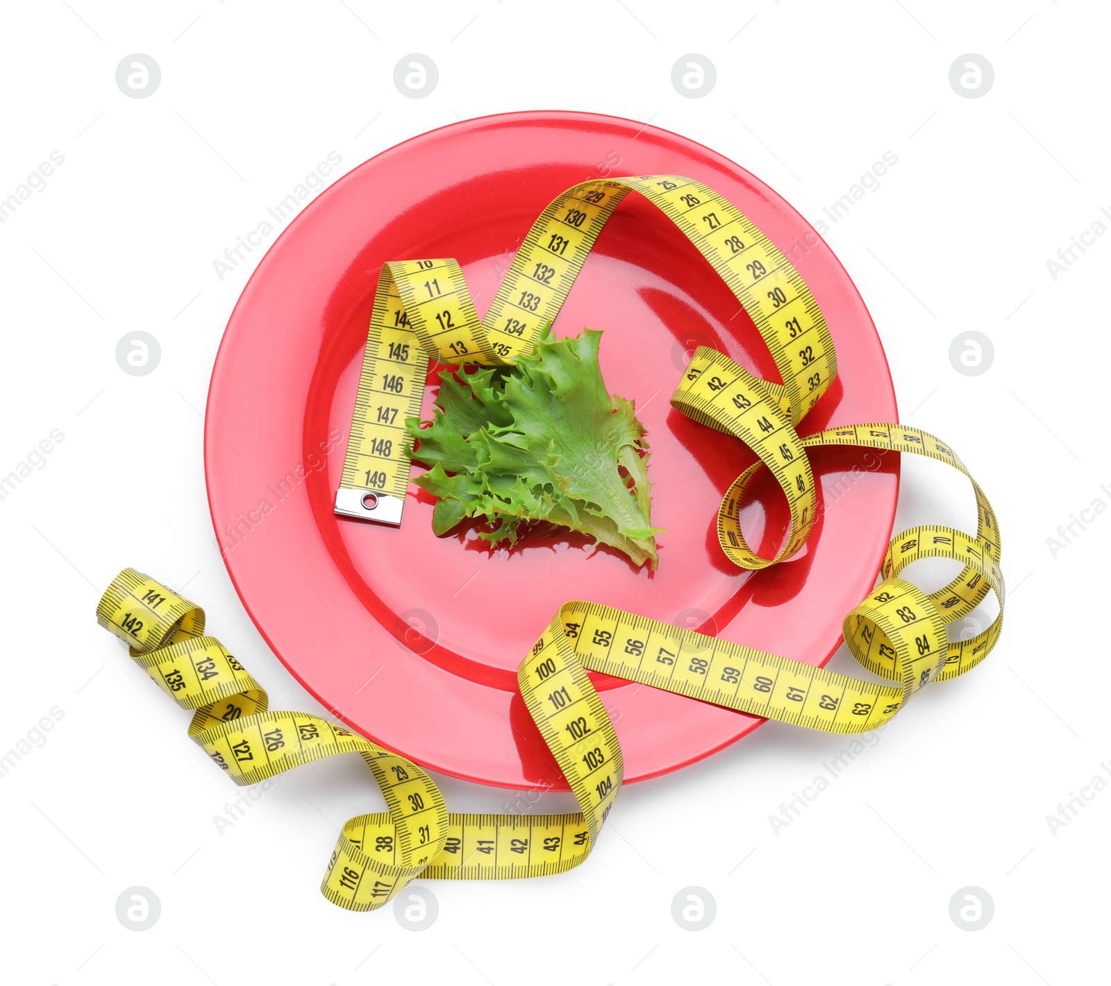 Photo of Measuring tape, plate and lettuce leaf isolated on white, top view. Diet concept