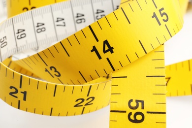 Photo of Yellow measuring tape, closeup