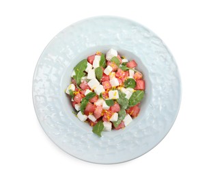 Photo of Delicious salad with watermelon, arugula and feta cheese isolated on white, top view