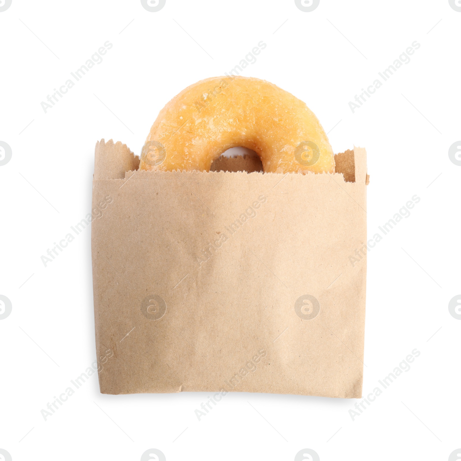 Photo of Delicious donut in paper bag isolated on white, top view