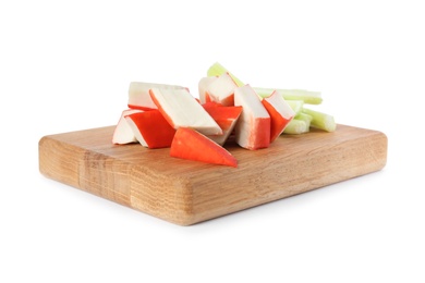 Fresh cut crab sticks with celery on white background,