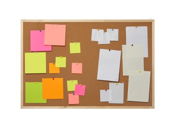 Empty notes pinned to cork board on white background