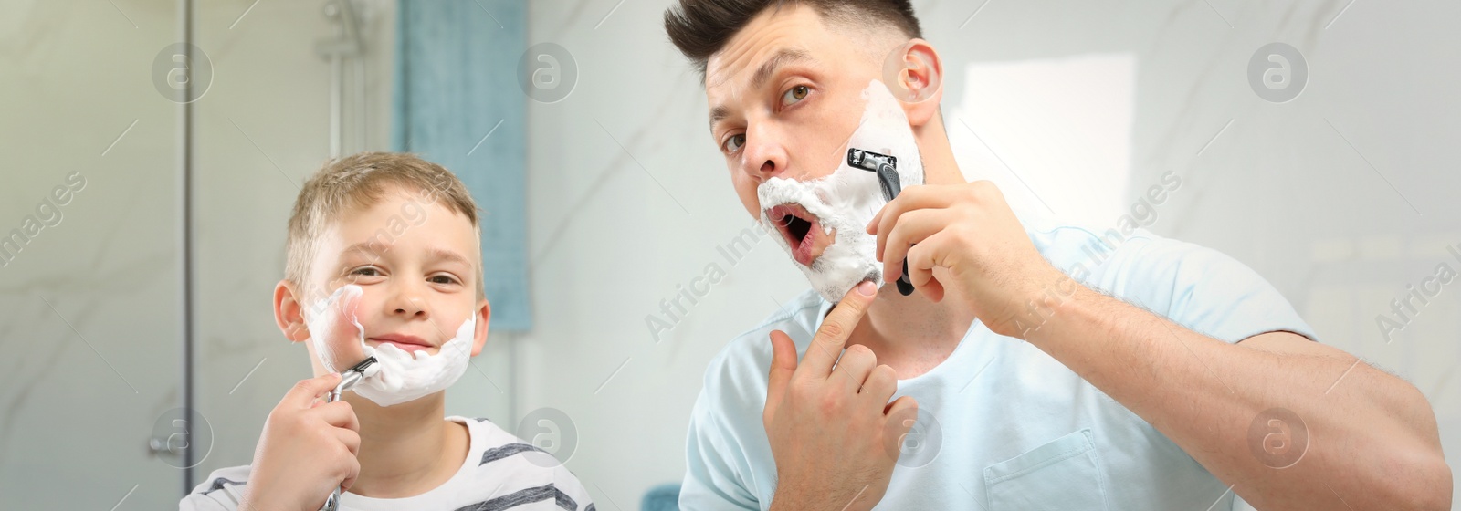 Image of Dad shaving and son imitating him in bathroom. Banner design