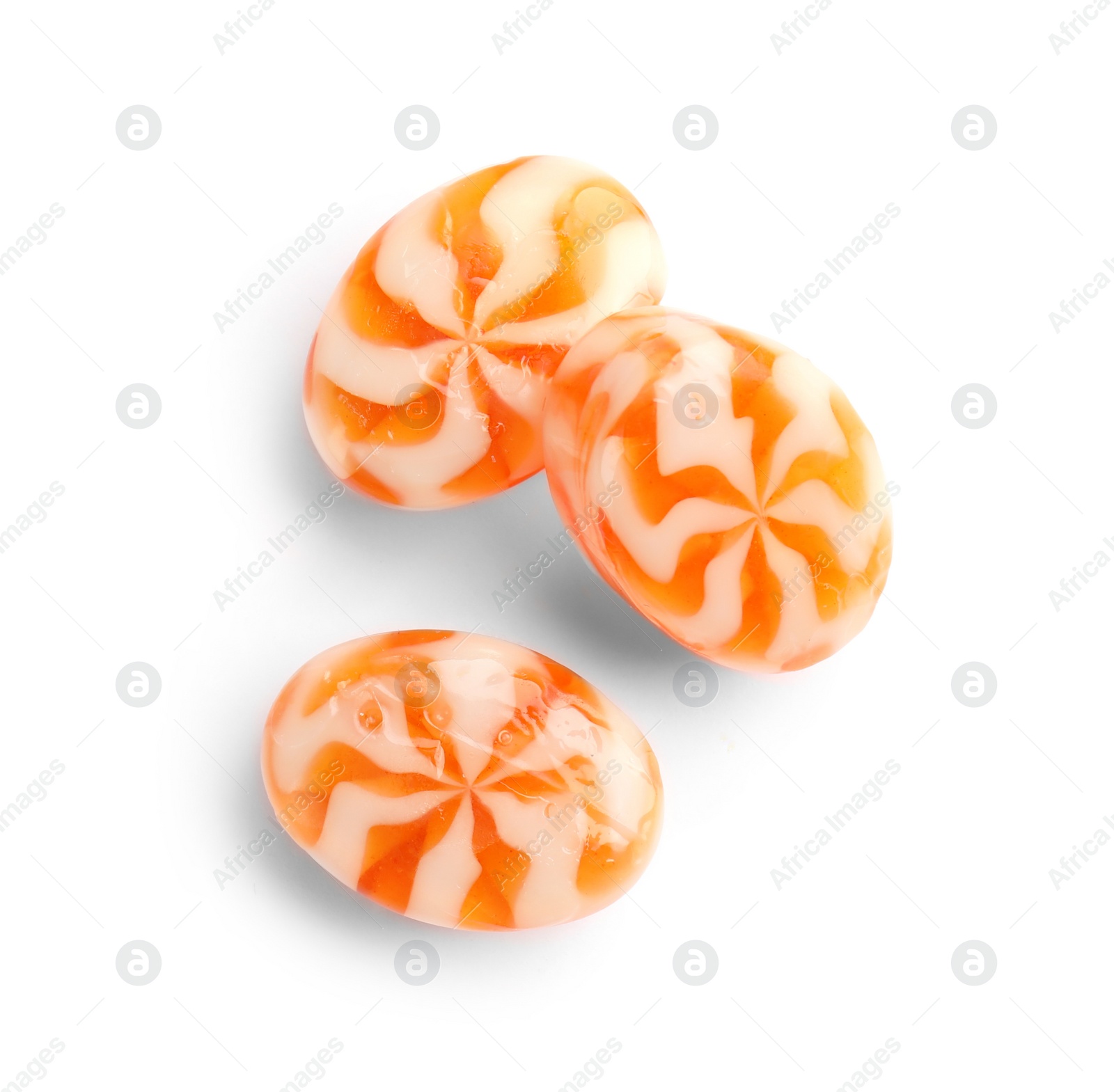 Photo of Delicious colorful candies on white background, top view