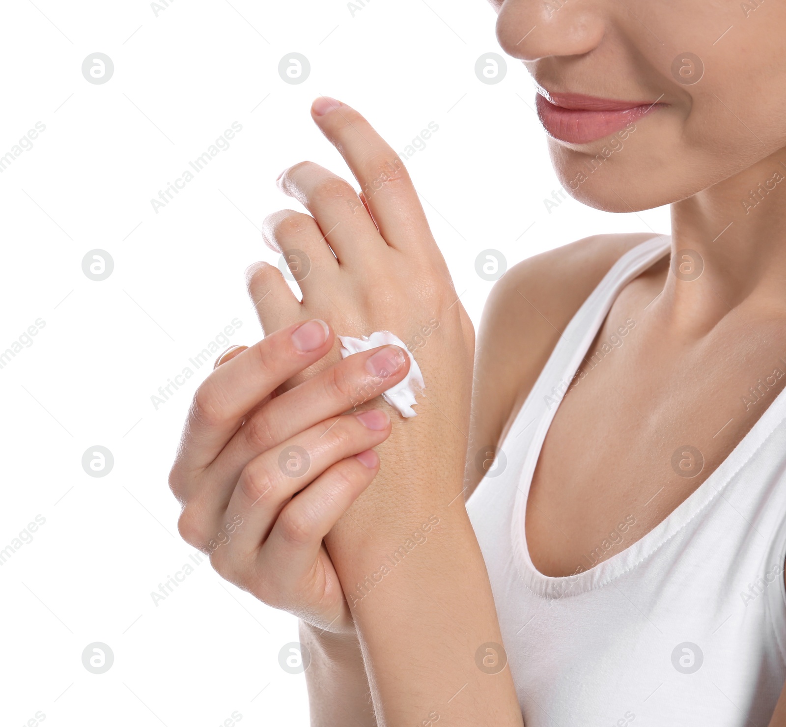 Photo of Young woman applying body cream on white background