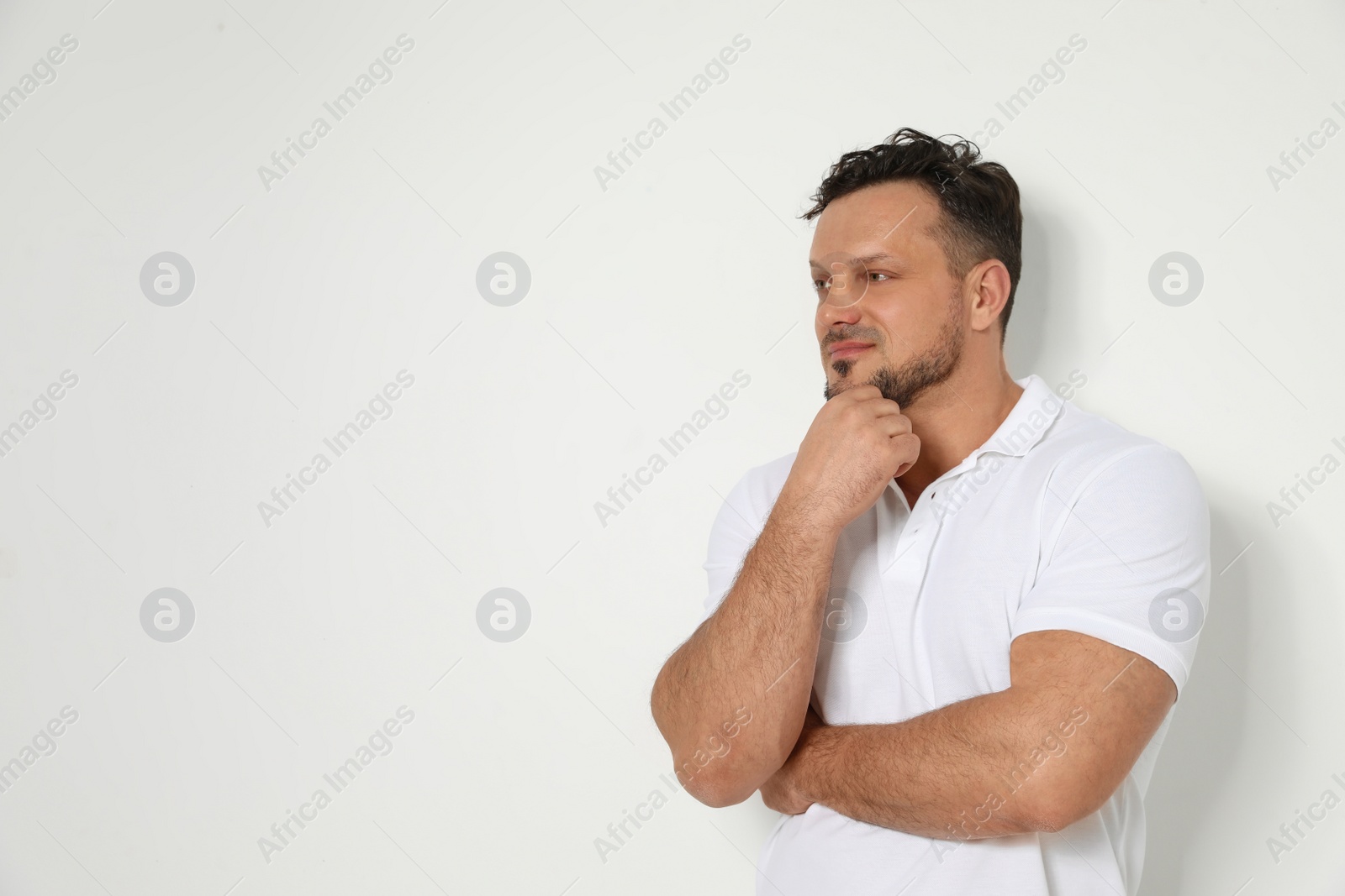 Photo of Portrait of handsome man on white background