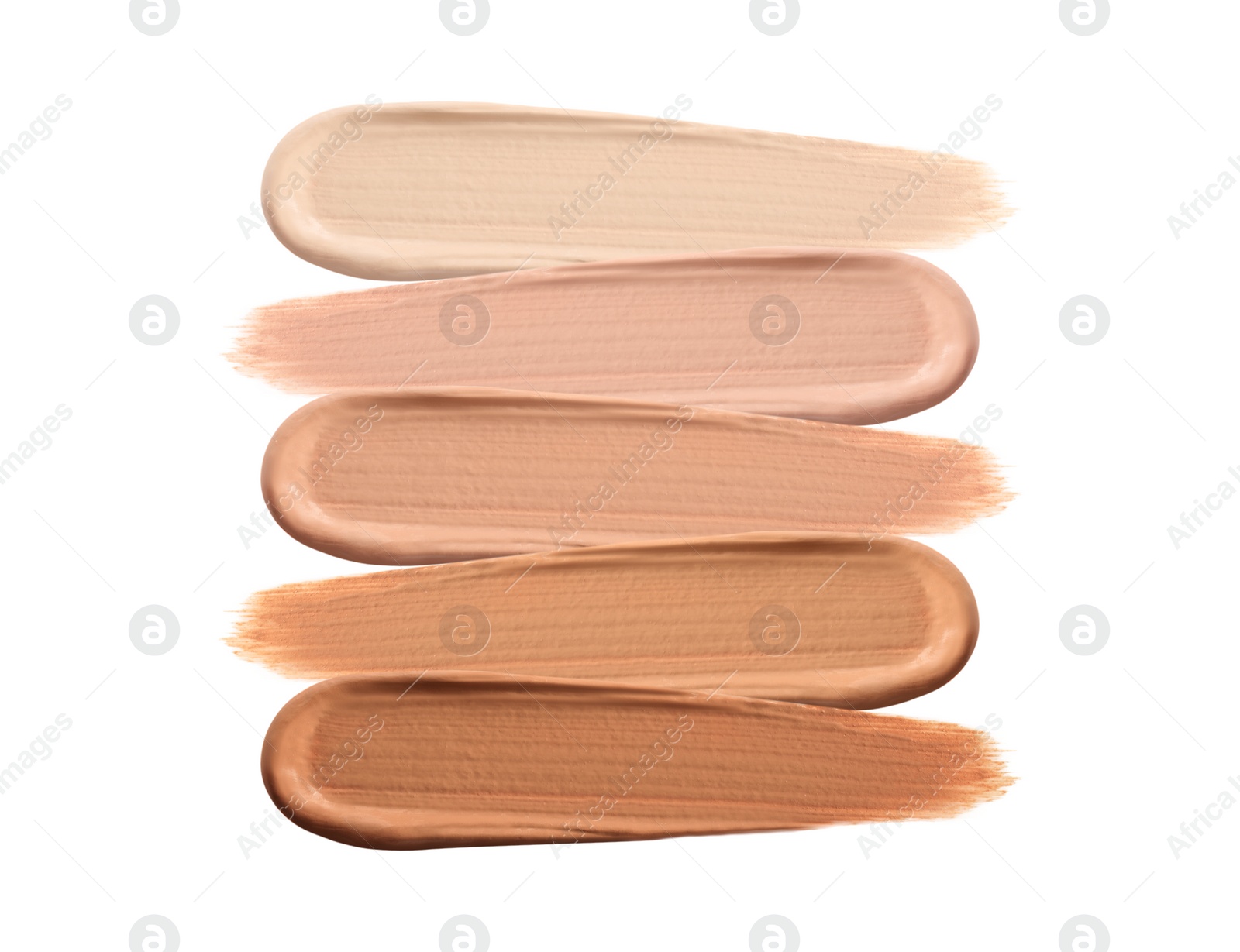 Image of Different shades of liquid skin foundation on white background, top view