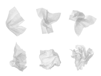 Image of Set with used crumpled paper tissues on white background