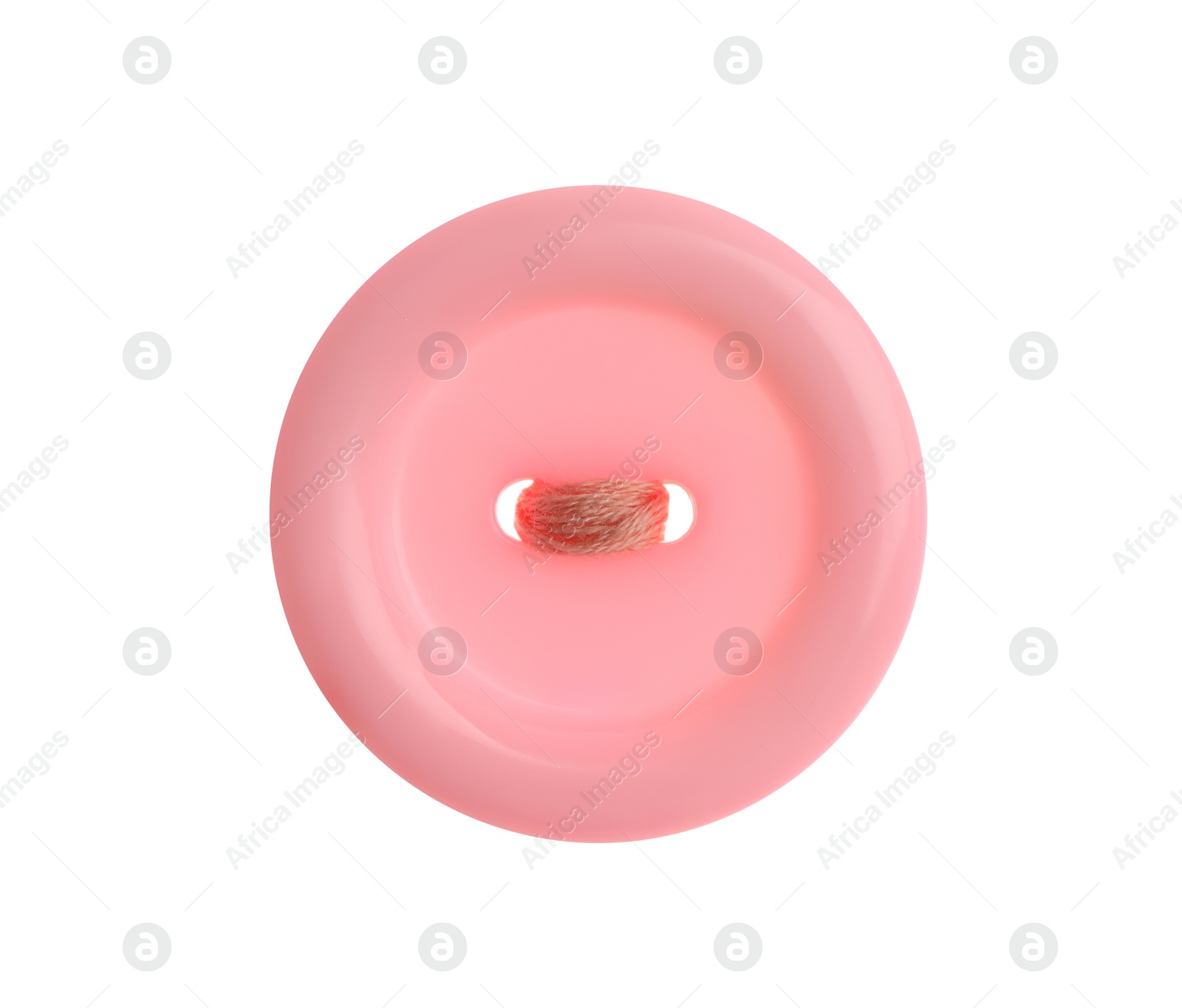 Photo of Pink plastic sewing button isolated on white, top view