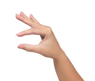 Woman holding something in fingers on white background