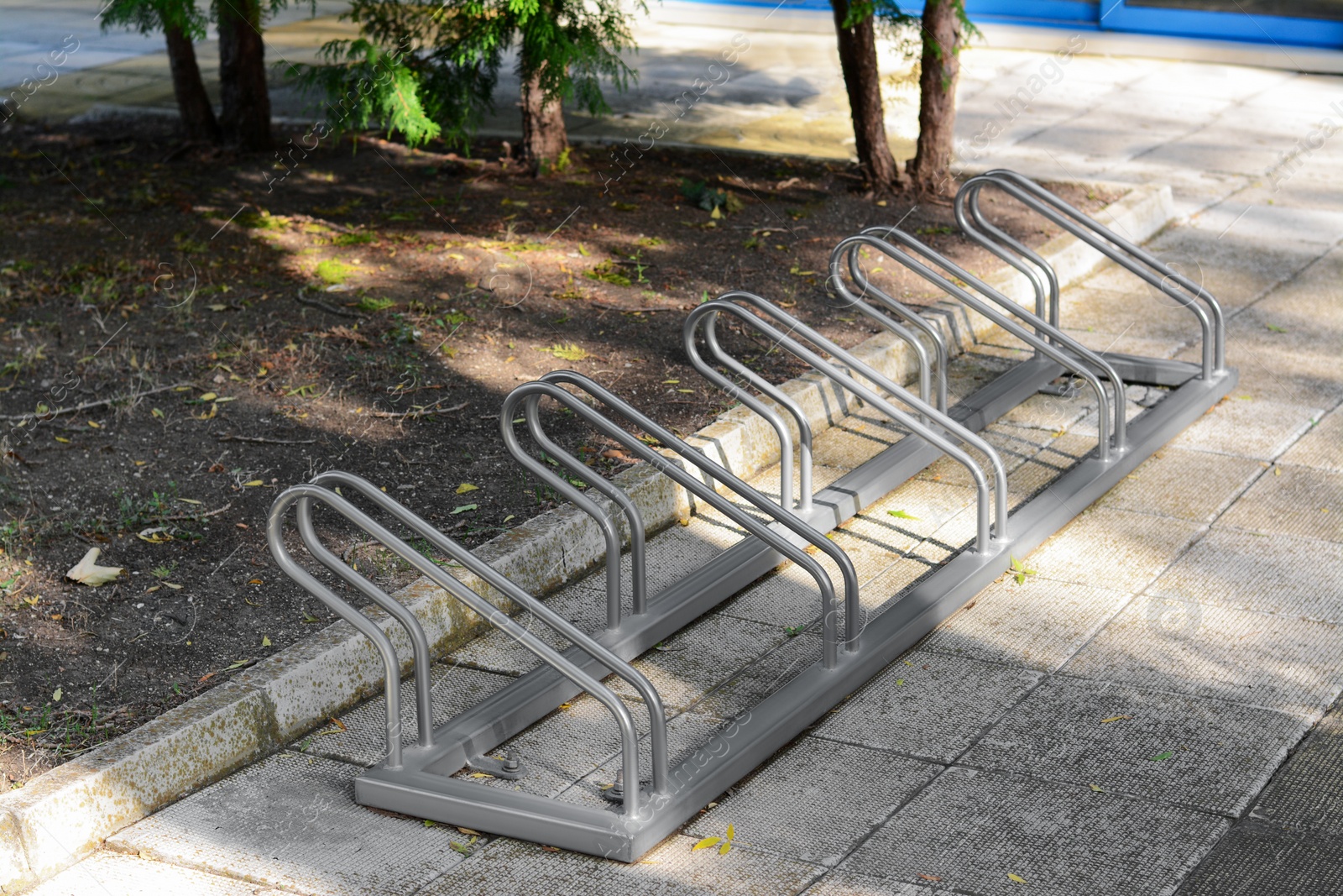 Photo of Metal bicycle parking rack on city street