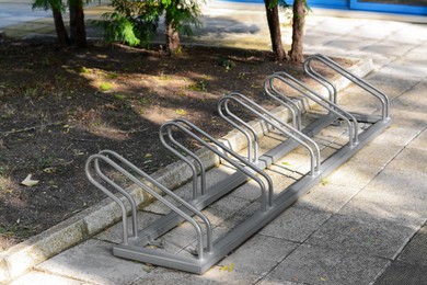 Photo of Metal bicycle parking rack on city street