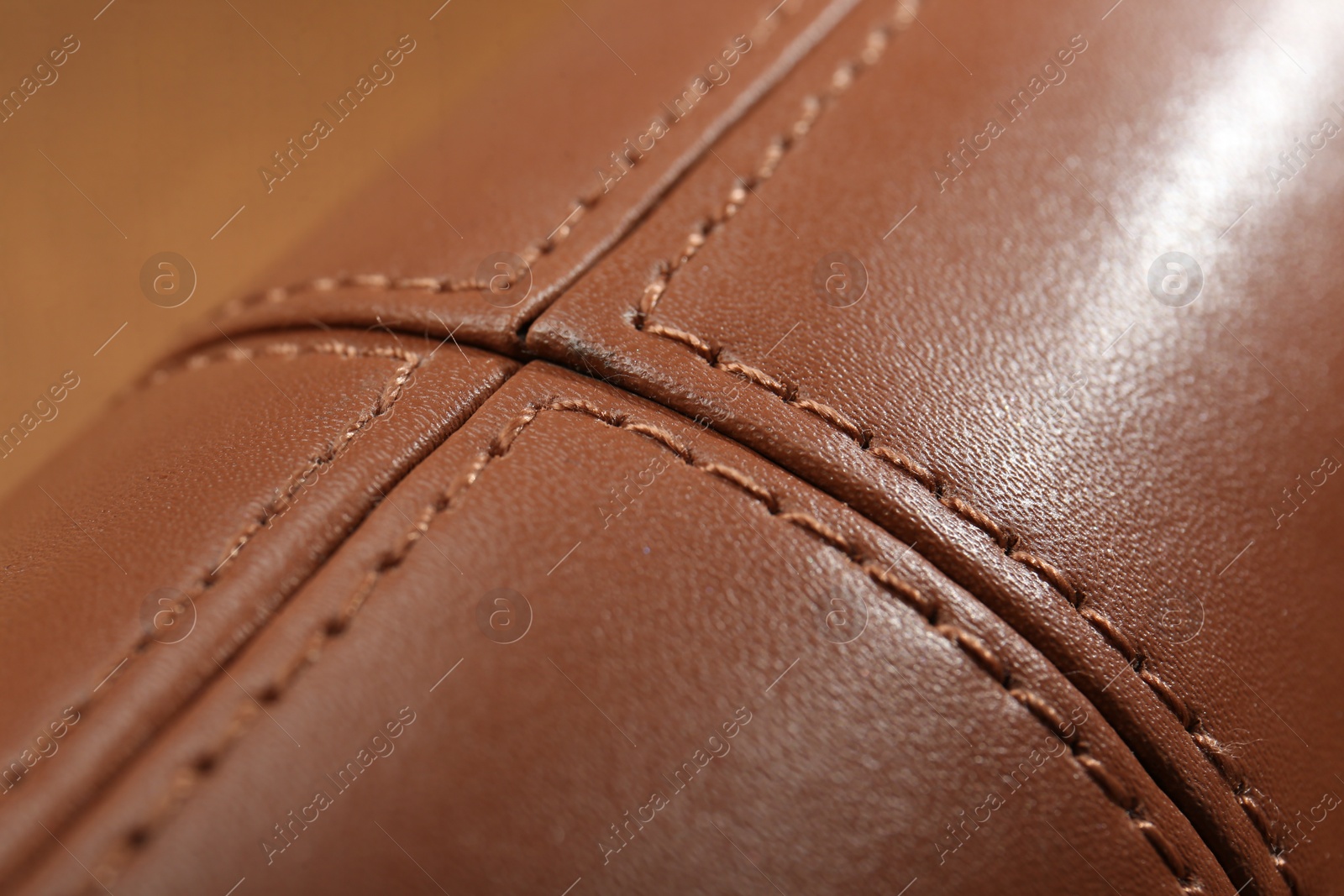 Photo of Texture of brown leather as background, closeup