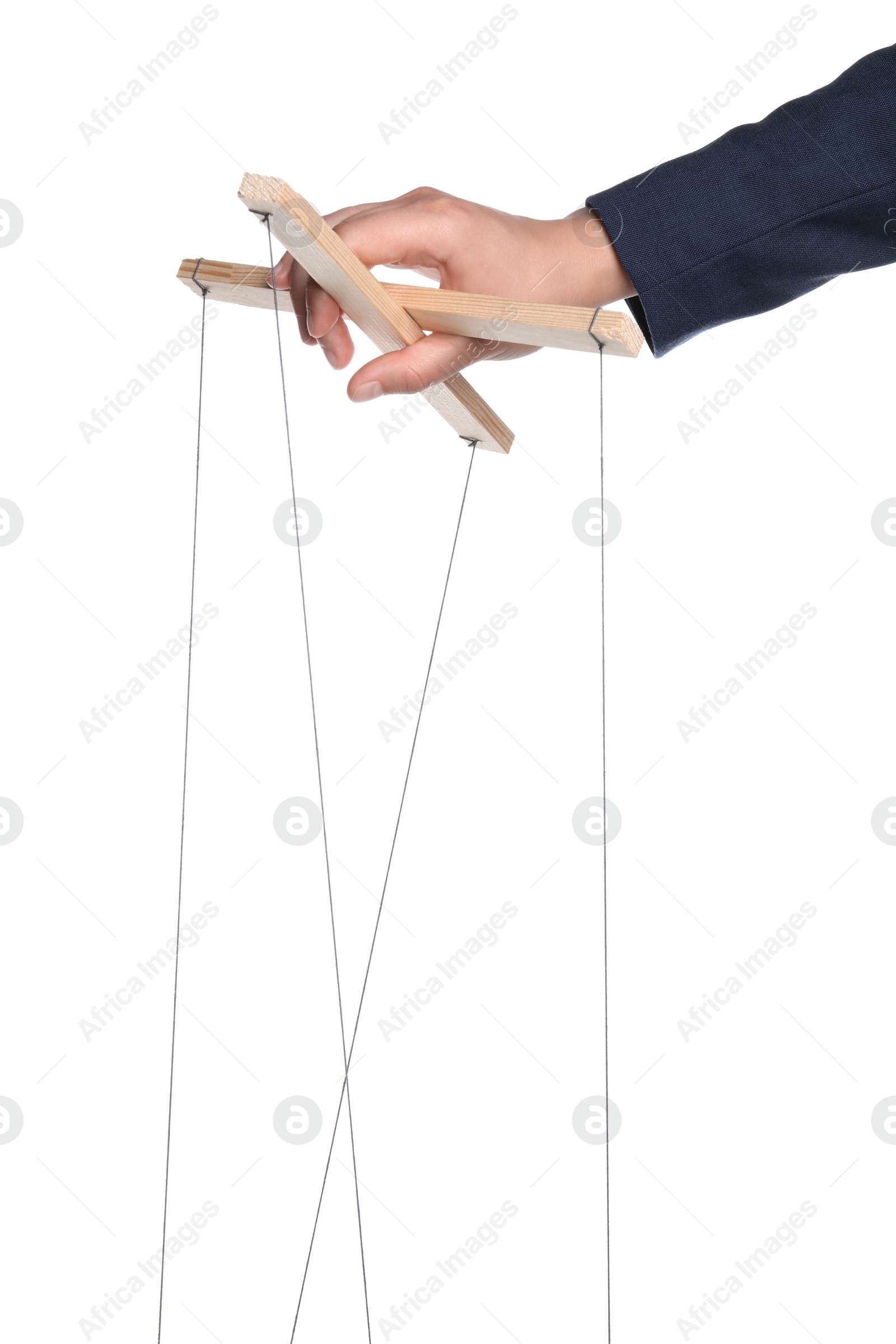 Photo of Businesswoman holding puppet control bar with strings on white background, closeup