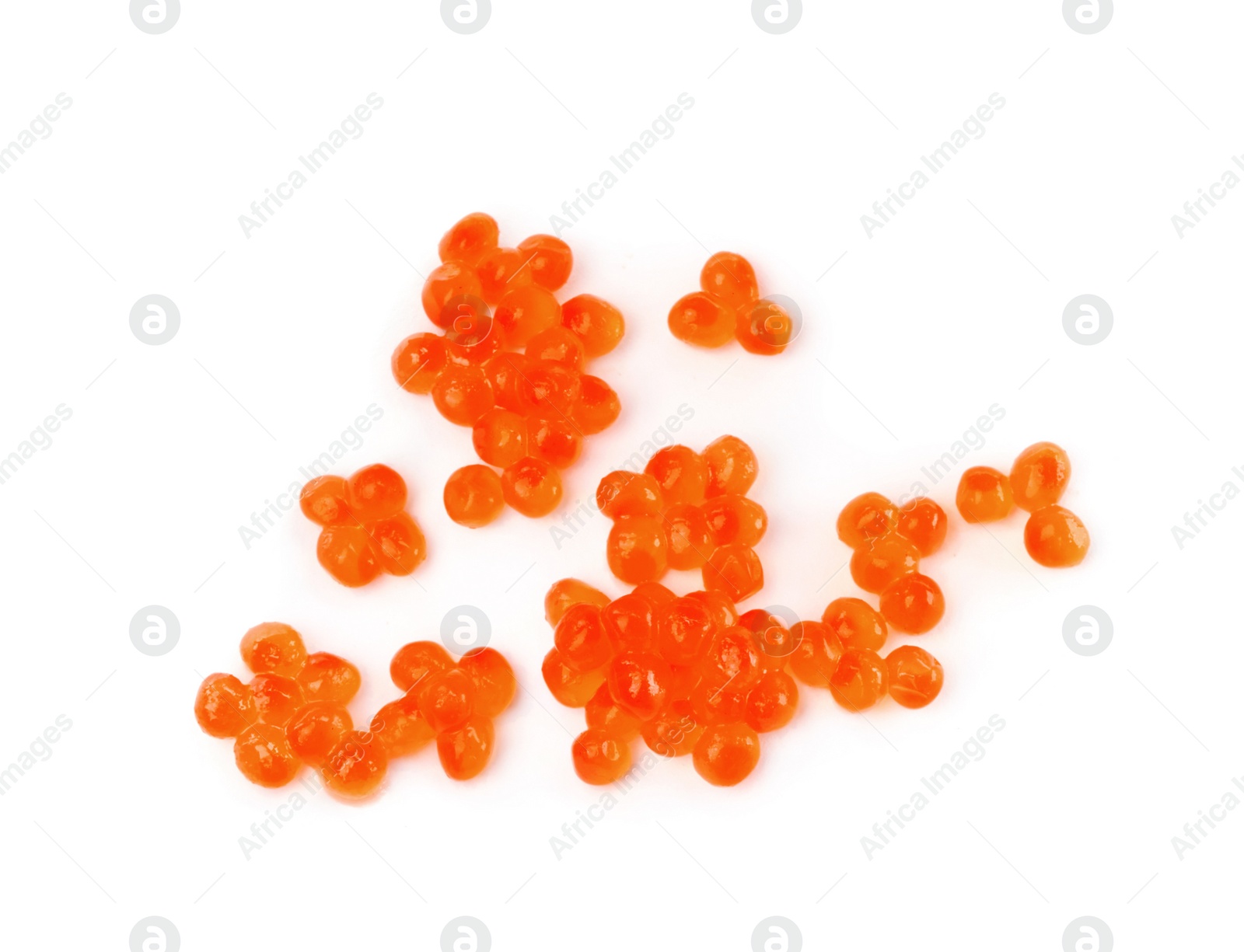 Photo of Delicious red caviar isolated on white, top view