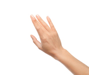 Photo of Young woman held out hand on white background, closeup