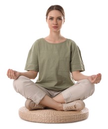 Photo of Beautiful young woman meditating on white background