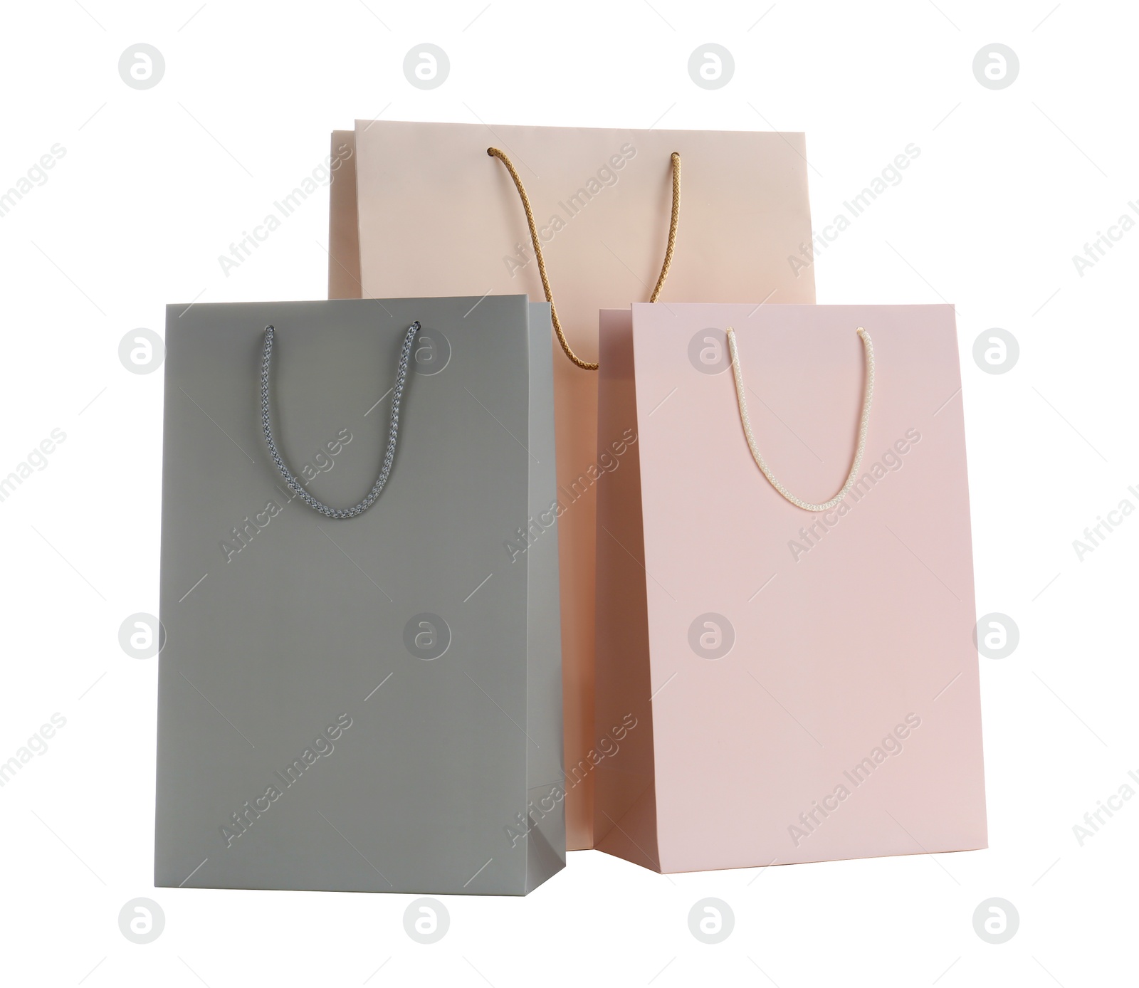 Photo of Different paper shopping bags isolated on white