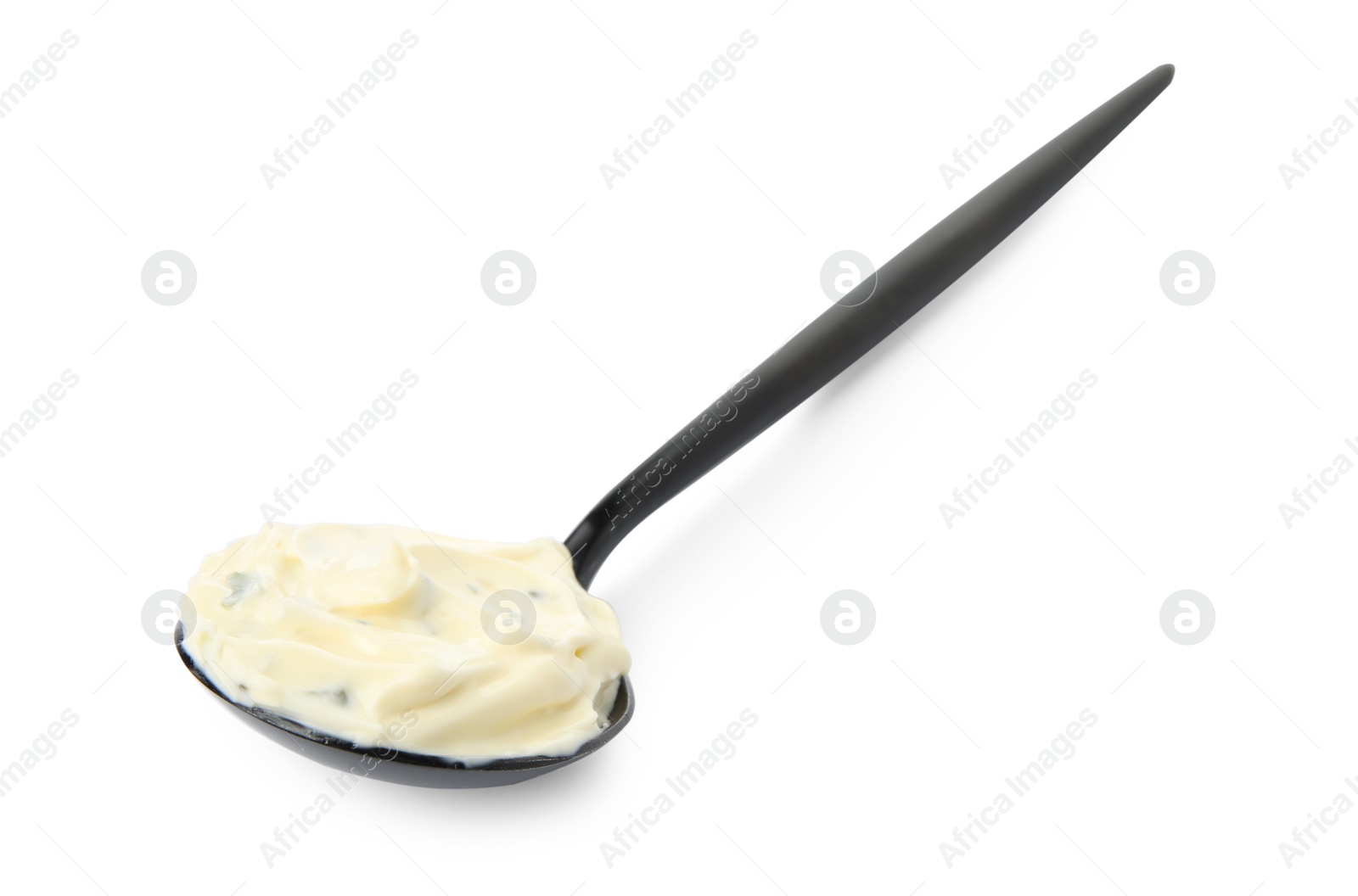 Photo of Tartar sauce in spoon isolated on white