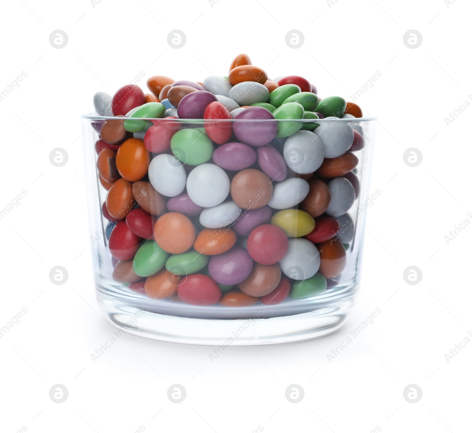 Photo of Delicious bright candies in glass isolated on white