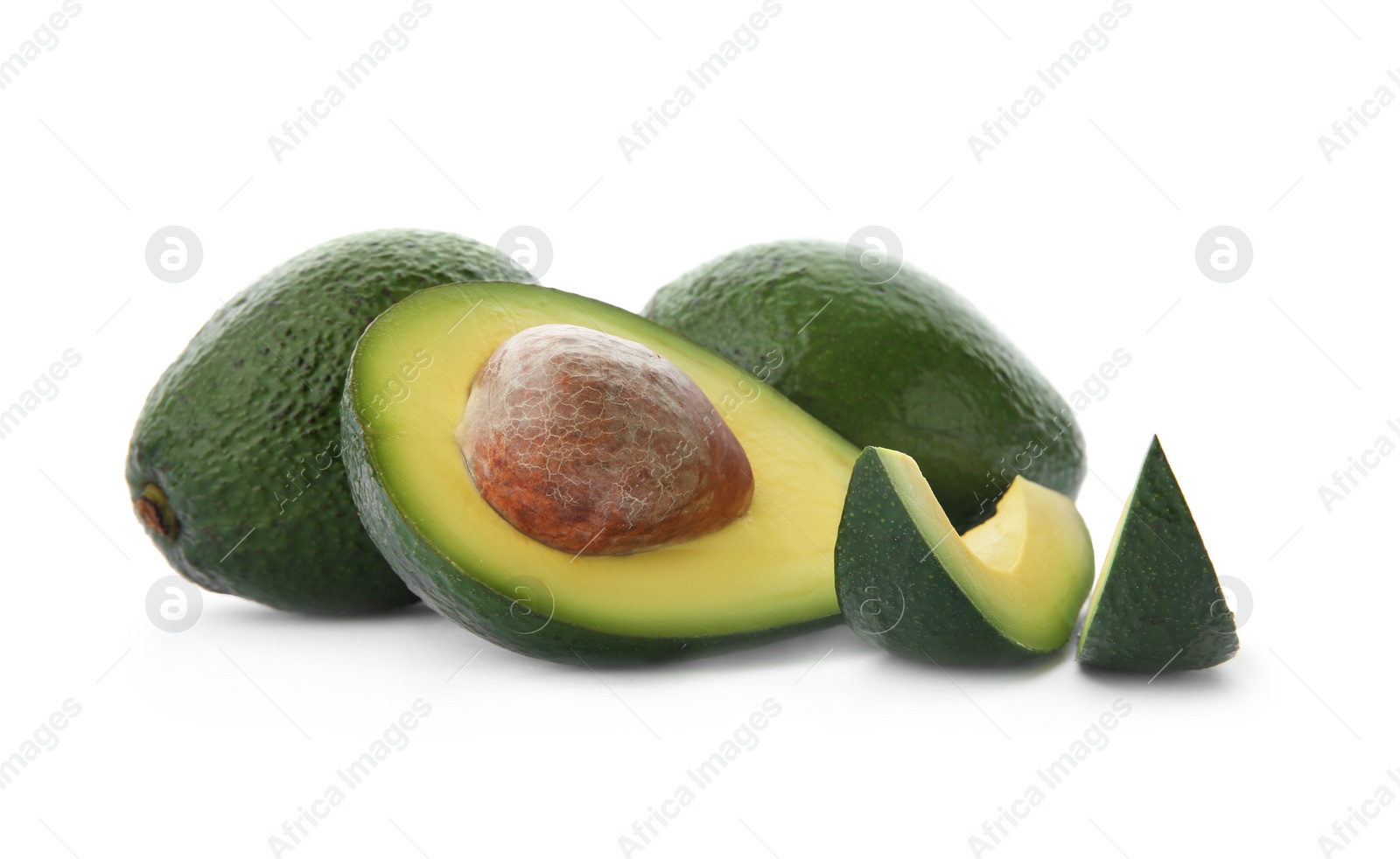 Photo of Ripe avocados on white background. Tropical fruit