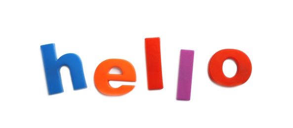 Photo of Word HELLO of magnetic letters on white background, top view