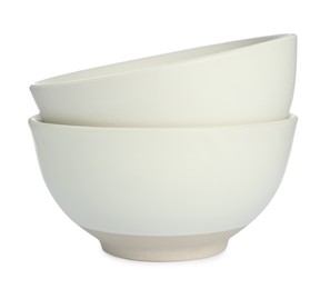 Photo of Stylish empty ceramic bowls on white background. Cooking utensil